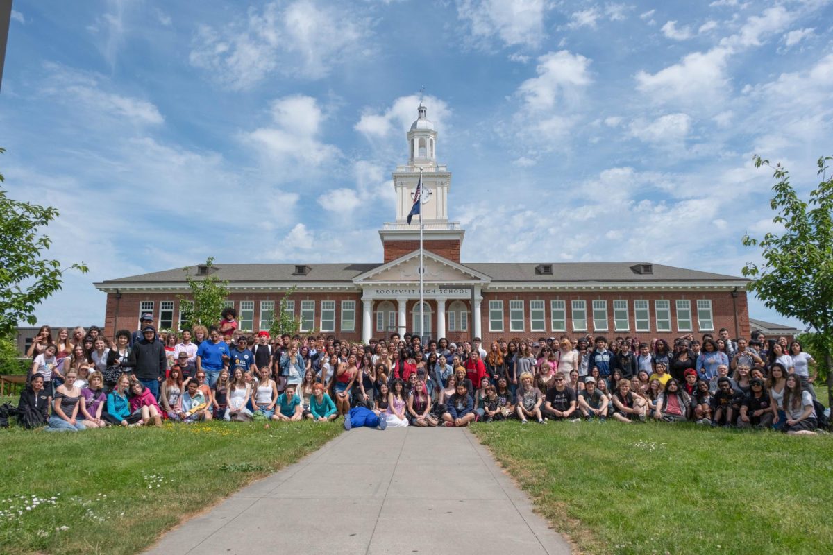 Roosevelt's senior class of 2026 group photo In front of Roosevelt High School.